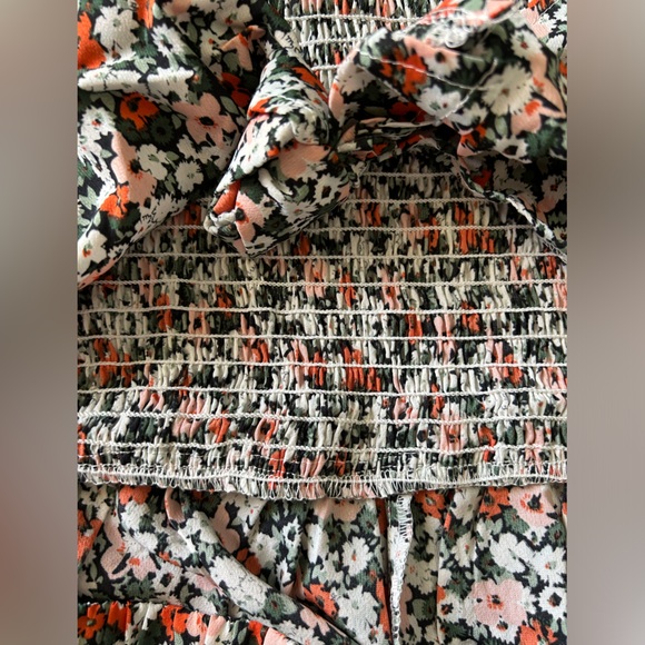 NEW Flirty Floral Print Romper Jumpsuit With Cut out Detail Chic-Knotted Front. - Picture 5 of 5